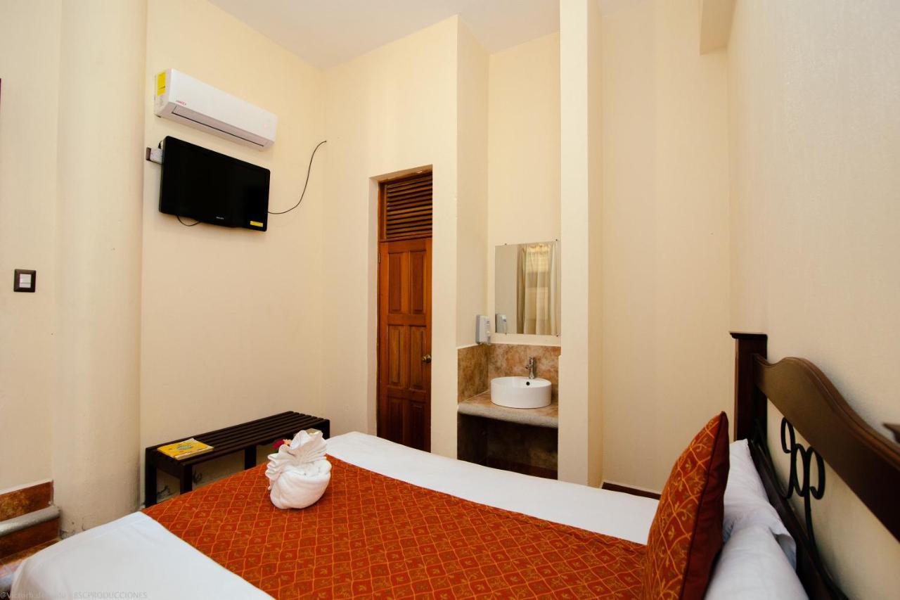 Hotel Quinta Maya Flores Bagian luar foto