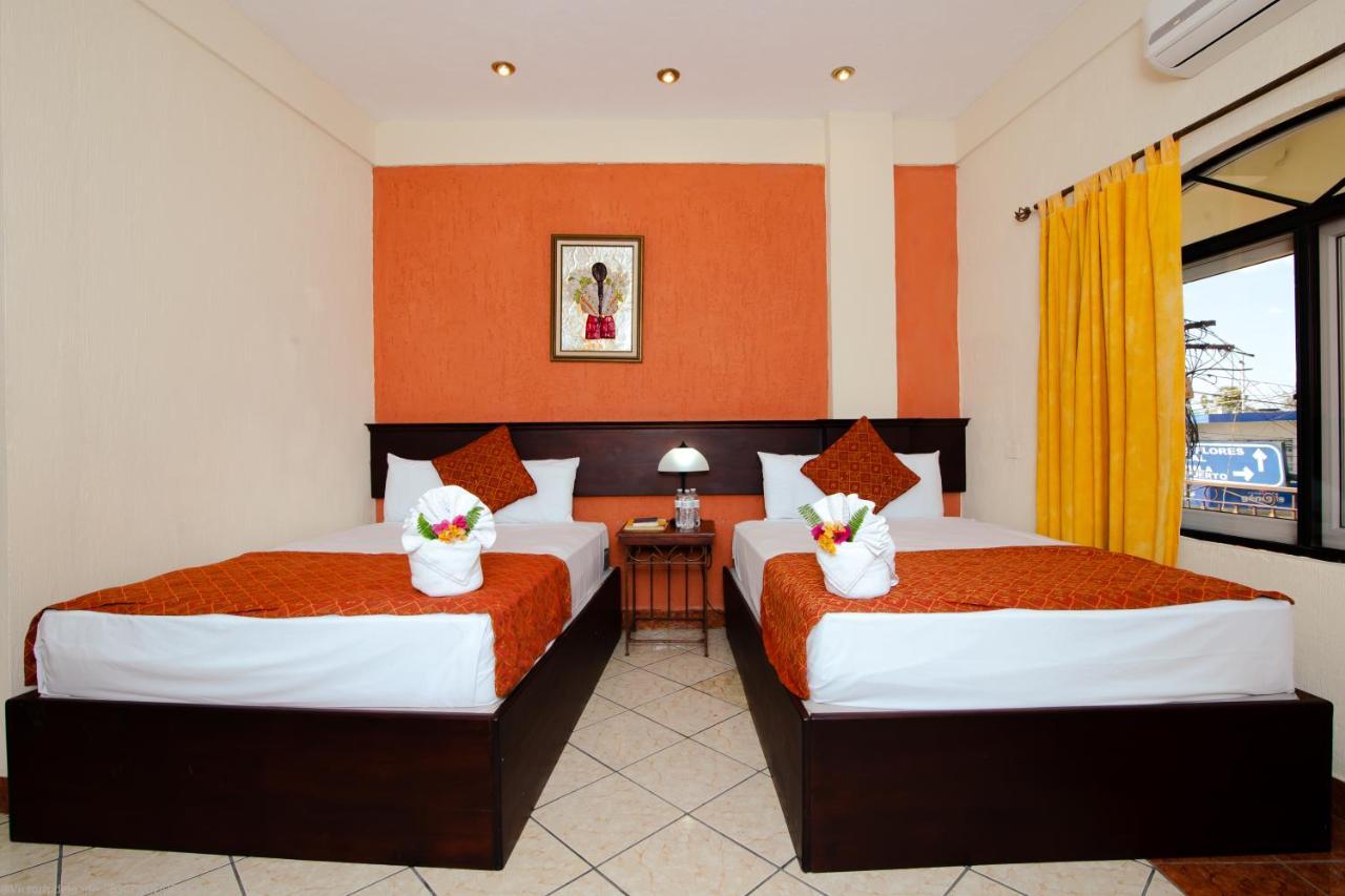 Hotel Quinta Maya Flores Bagian luar foto