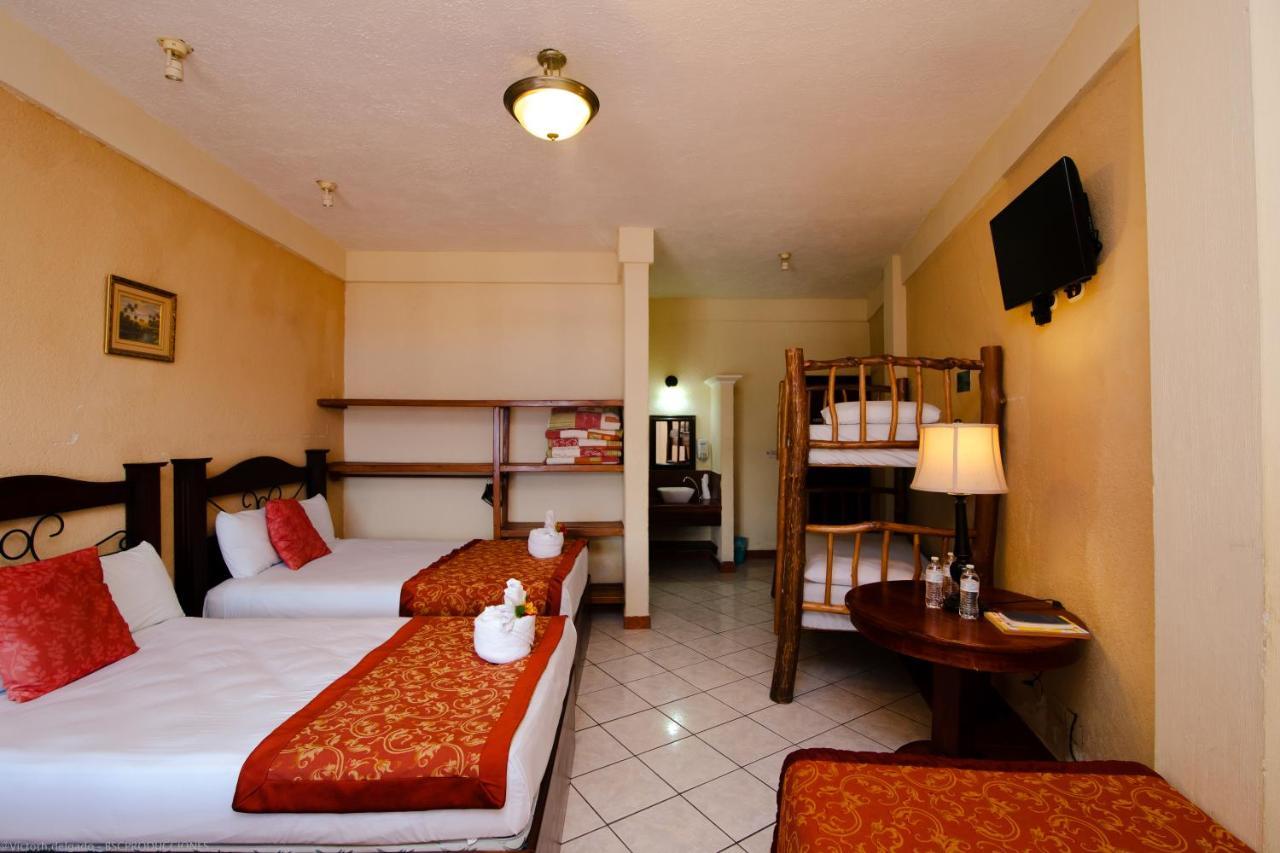 Hotel Quinta Maya Flores Bagian luar foto