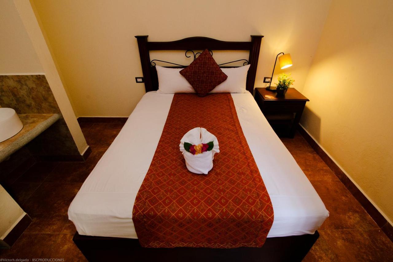 Hotel Quinta Maya Flores Bagian luar foto