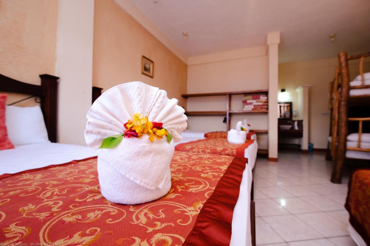 Hotel Quinta Maya Flores Bagian luar foto