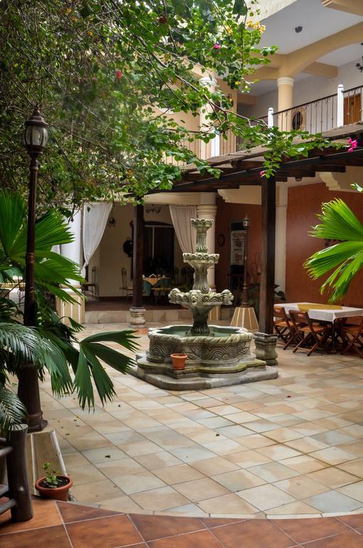 Hotel Quinta Maya Flores Bagian luar foto