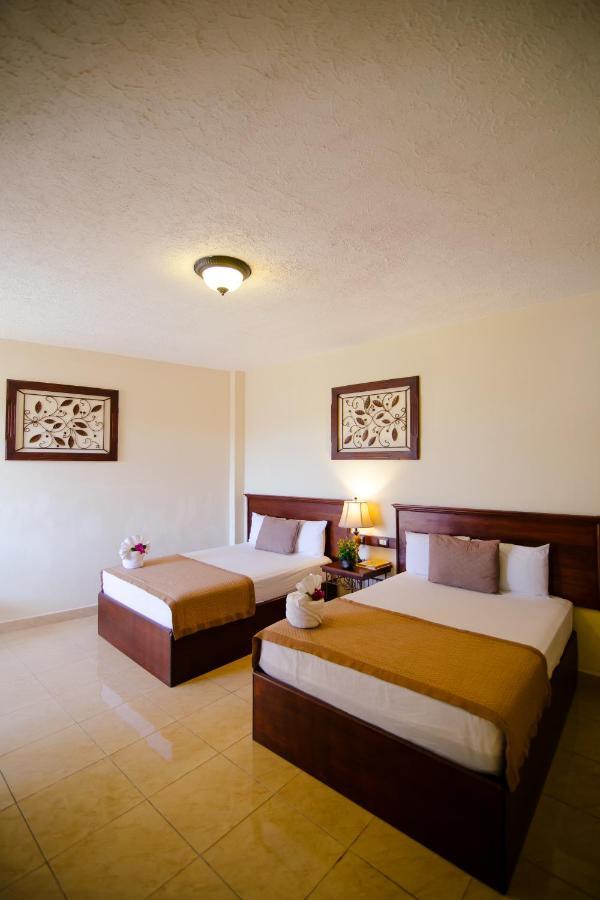 Hotel Quinta Maya Flores Bagian luar foto